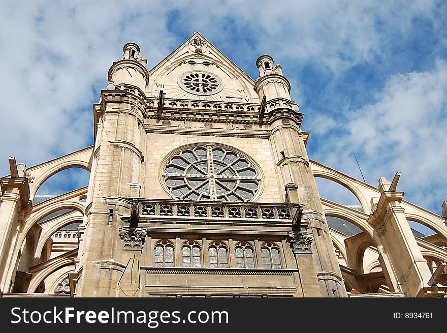 Facade of an ancient cathedral in Paris