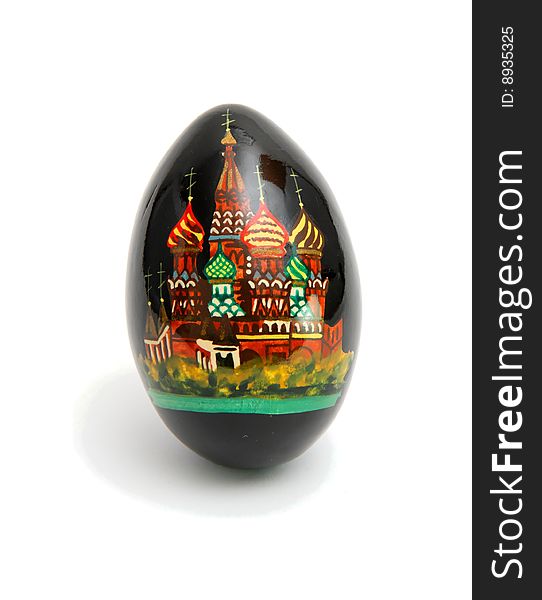 Russian Easter egg painted black with Saint Basil's cathedral on white background. Russian Easter egg painted black with Saint Basil's cathedral on white background