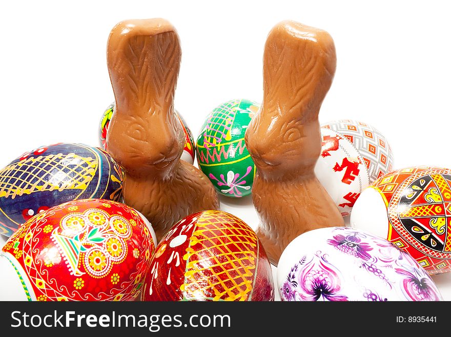 Chocolate easter rabbit in surroundings easter eggs