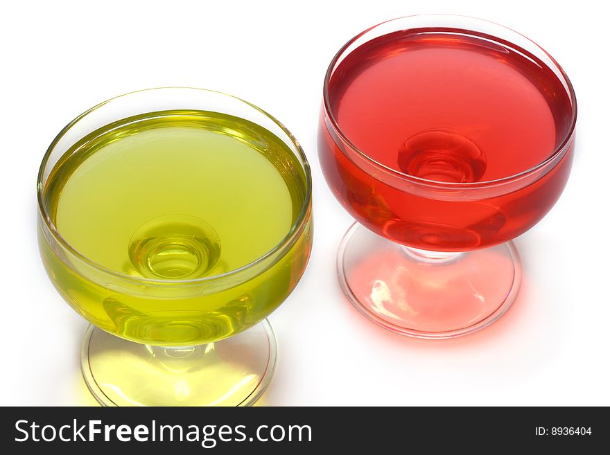 Red jelly in transparent glass, transparent, on white background. Red jelly in transparent glass, transparent, on white background
