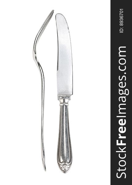 Knife and fork isolated on white background. With clipping path. Knife and fork isolated on white background. With clipping path.