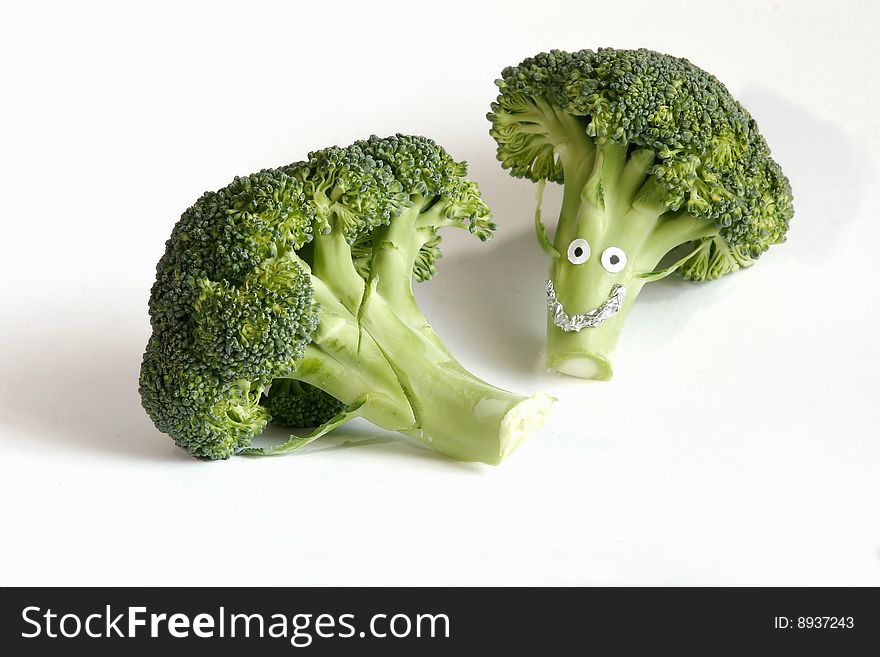 Green fresh broccoli on white background
