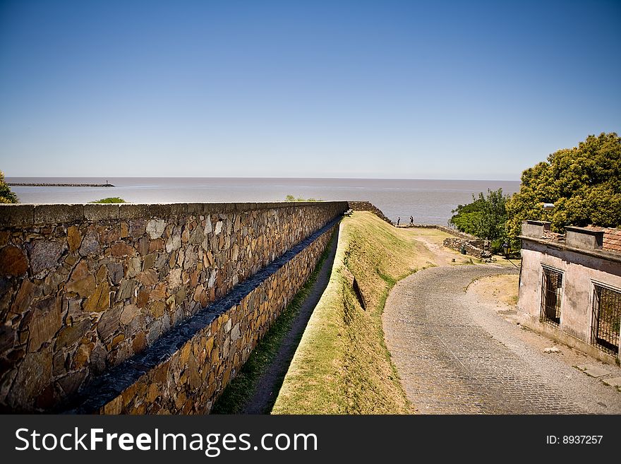 Colonia del Sacramento (formerly the Portuguese Colonia do Sacramento) is a city in southwestern Uruguay, by the Rio de la Plata, facing Buenos Aires, Argentina. It is the oldest town in Uruguay and capital of the departamento of Colonia. Colonia del Sacramento (formerly the Portuguese Colonia do Sacramento) is a city in southwestern Uruguay, by the Rio de la Plata, facing Buenos Aires, Argentina. It is the oldest town in Uruguay and capital of the departamento of Colonia.