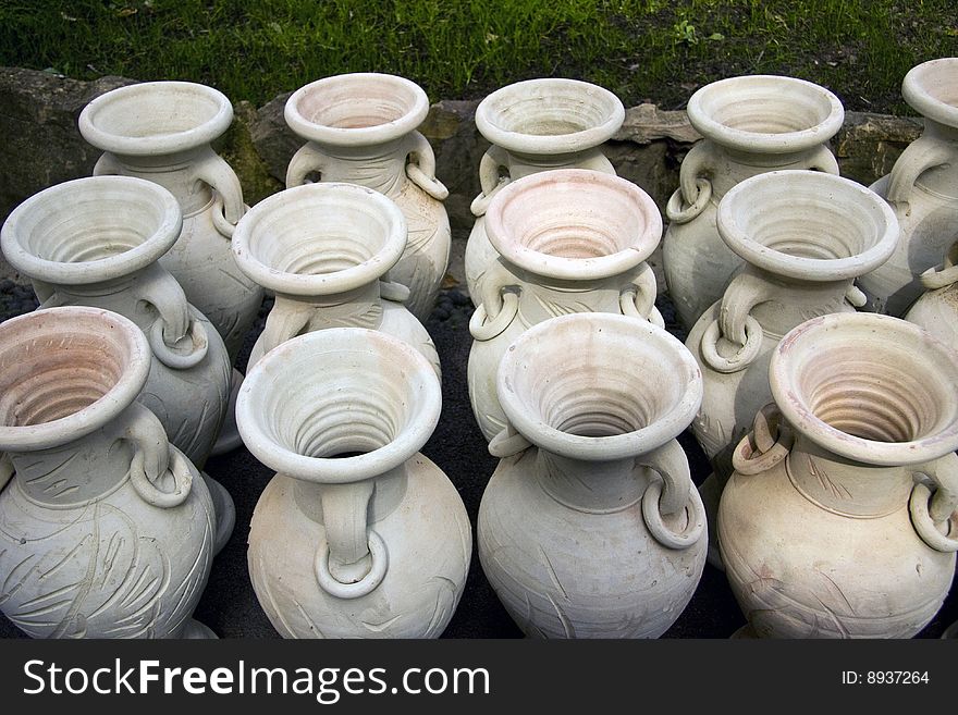 Three-row ordinated of vases. Three-row ordinated of vases