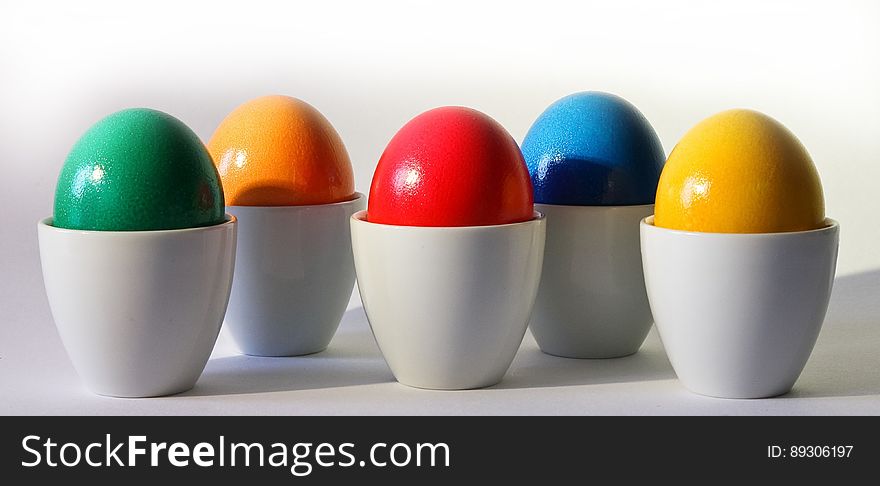 Multicolored Egg Ornament On White Desk