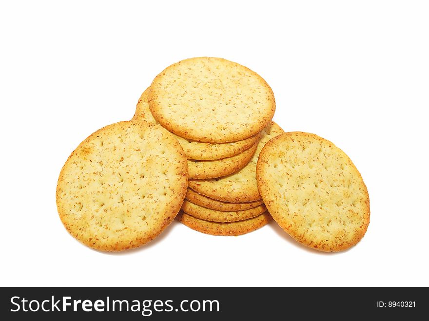 Salted yellow crackers isolated on the white background. Salted yellow crackers isolated on the white background.