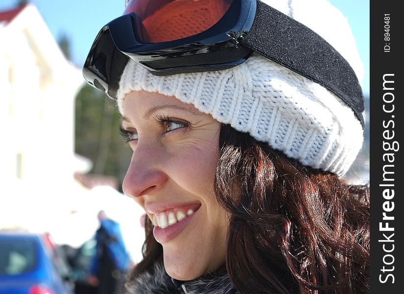 Portrait of happy young mountain- skier resting on the ski resort. Portrait of happy young mountain- skier resting on the ski resort