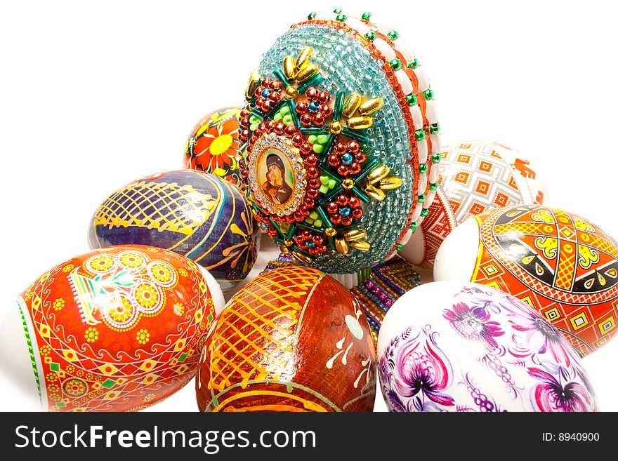 An easter eggs is decorated a bead on a white background