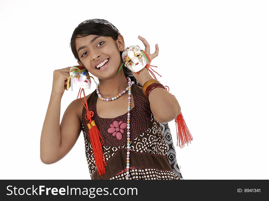 Beautiful girl holding two mask wearing necklace. Beautiful girl holding two mask wearing necklace