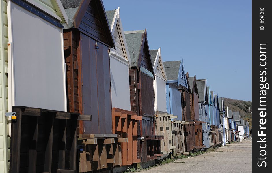 A row of beach huts at a english seaside town.