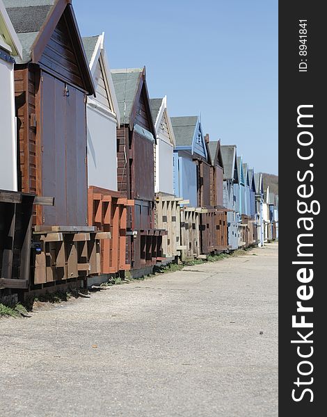 A row of beach huts at a english seaside town.