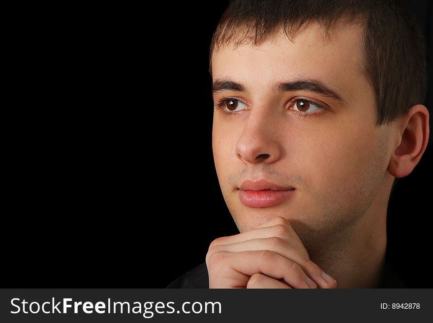 Portrait of serious young man in shirt. Portrait of serious young man in shirt