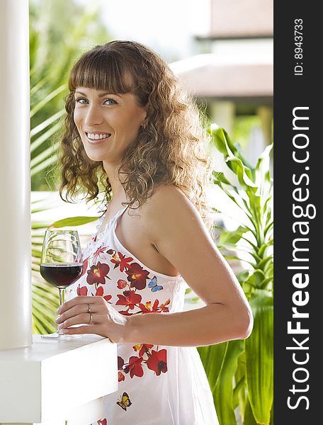 Portrait of young attractive woman having good time in tropic environment. Portrait of young attractive woman having good time in tropic environment