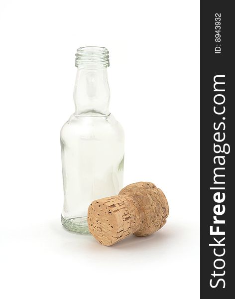 Bottle and cork on white background. Selective focus