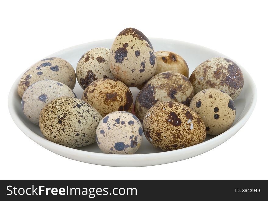 Quail eggs isolated on white background. Selective focus