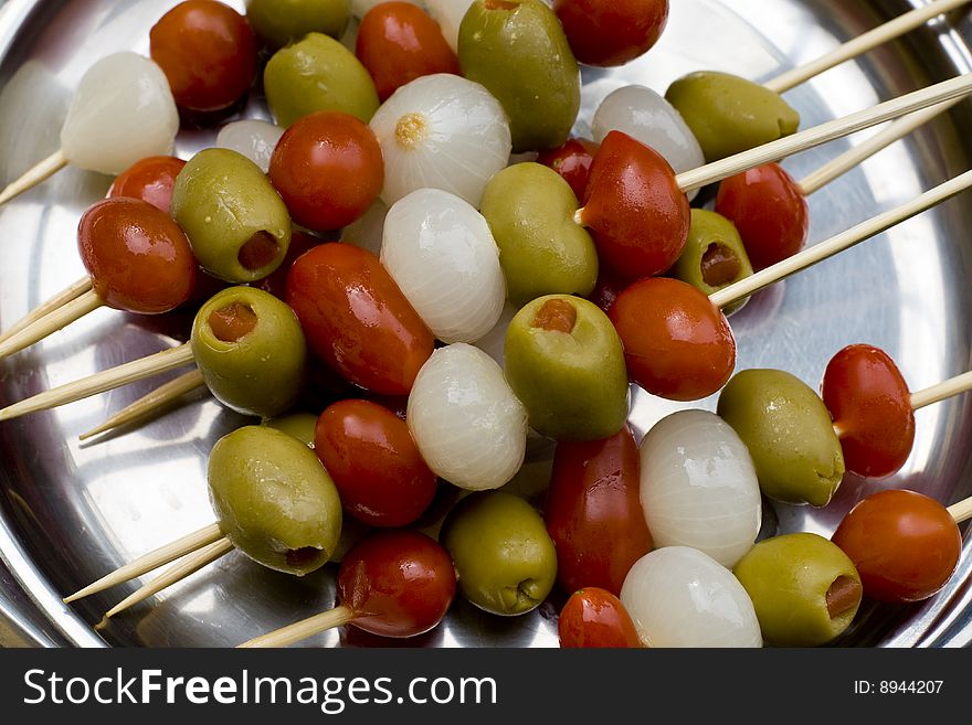 Colorful italian mixed appetizer on a silver tray