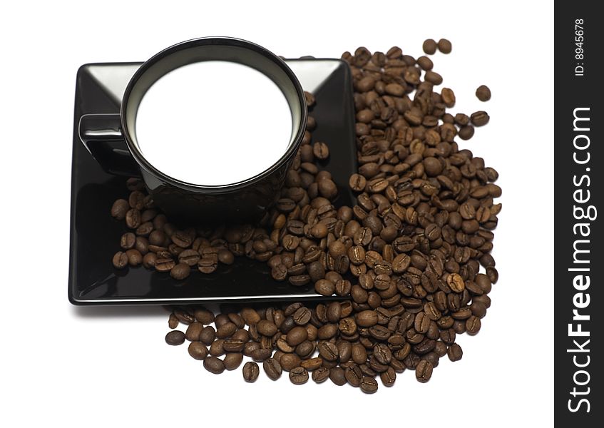 A lovely set of a coffee mug and coffee beads, isolated on a white background.