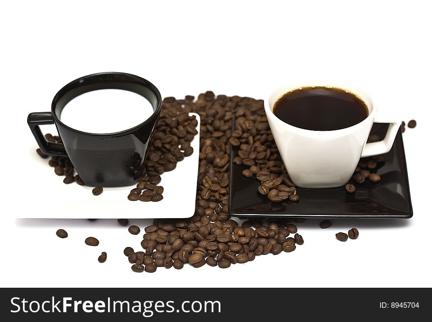A lovely set of a coffee mug and coffee beads, isolated on a white background.