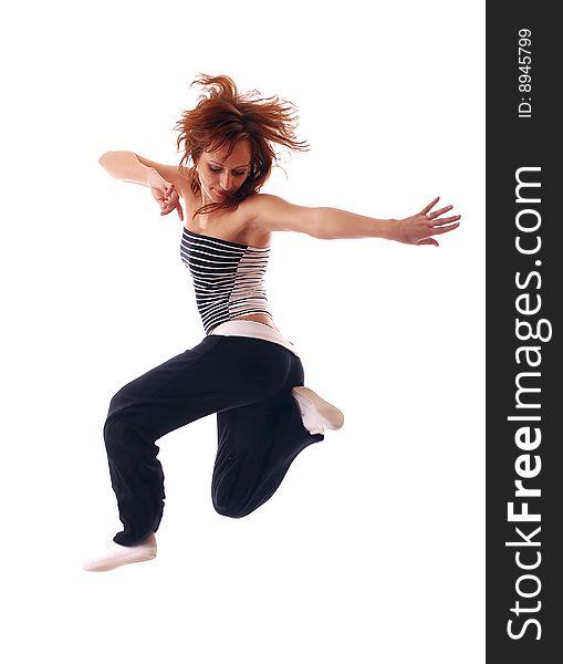 Attractive teenage dancing over white background