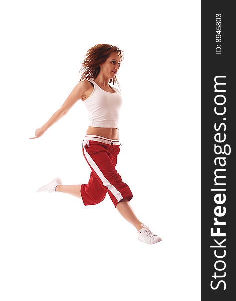 Attractive Teenage Dancing Over White Background