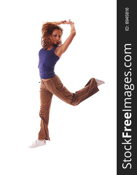 Attractive teenage dancing over white background