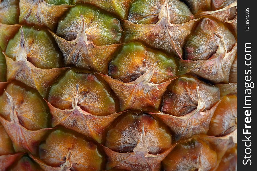 Closeup of nice fresh yellow-brown pineapple texture