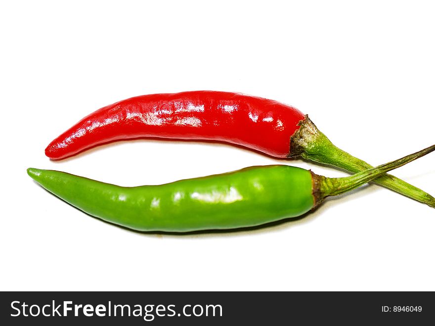 Close up capture on green and red spicy chili. Close up capture on green and red spicy chili