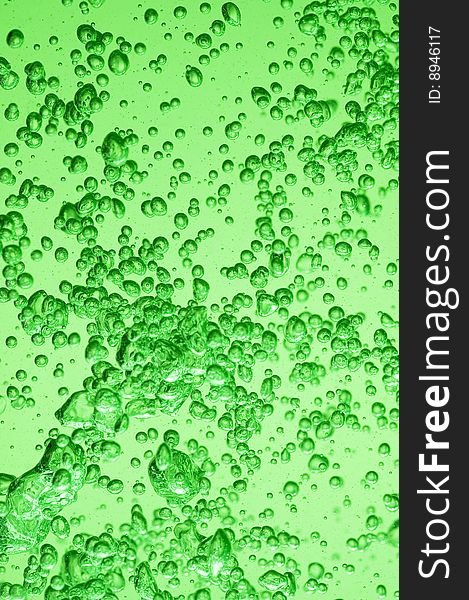 Background with splashing water.Green textute