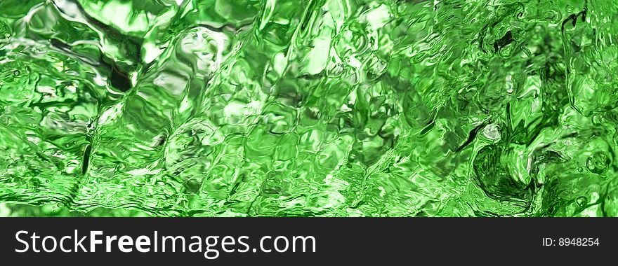 Background with splashing water.green water