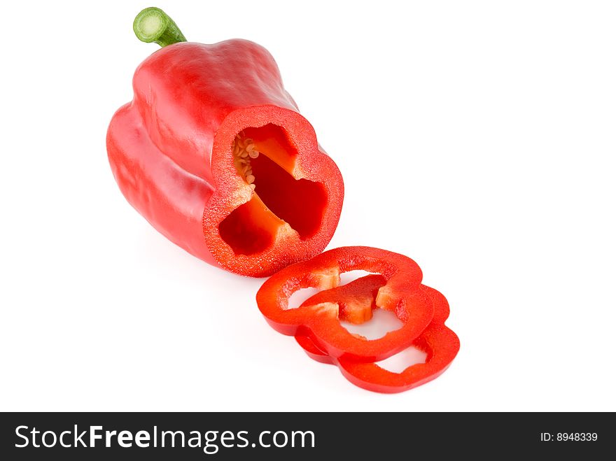 Red  sweet pepper  is photographed on the white background. Red  sweet pepper  is photographed on the white background