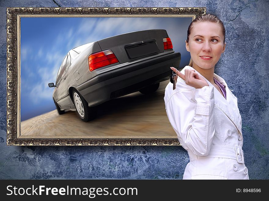 Beautiful women with keys of car on the grunge background