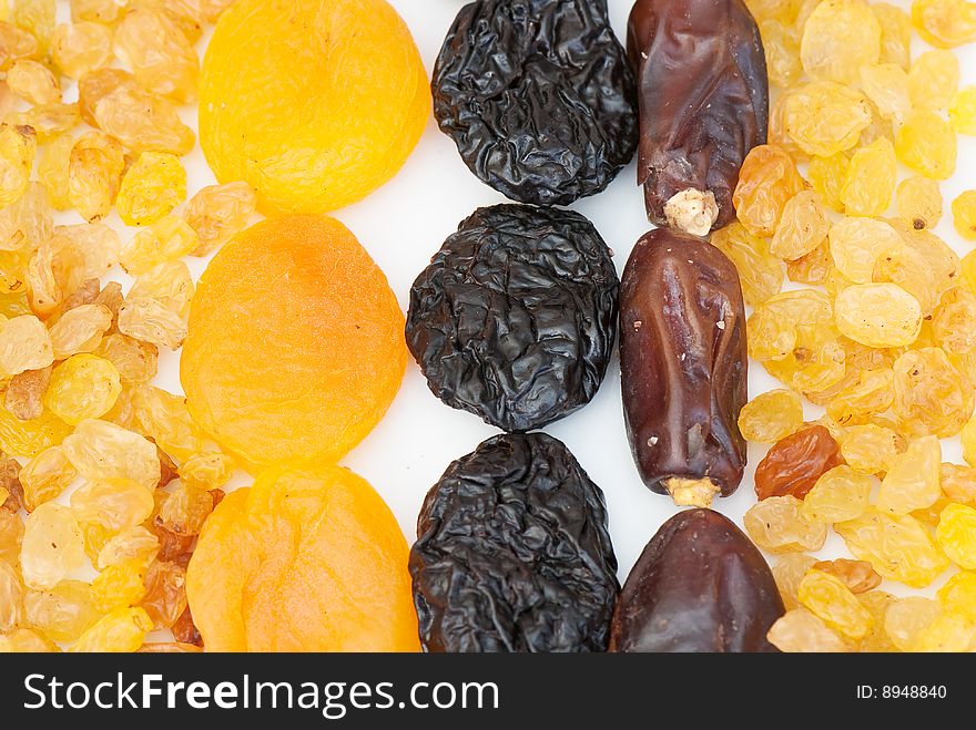 Composition from dried fruits on a light background
