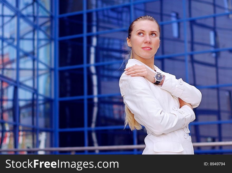 Business women in white on business architecture background