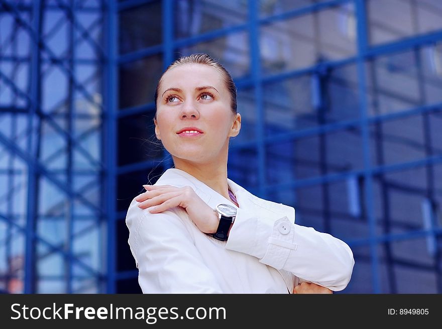 Business women in white on business architecture background