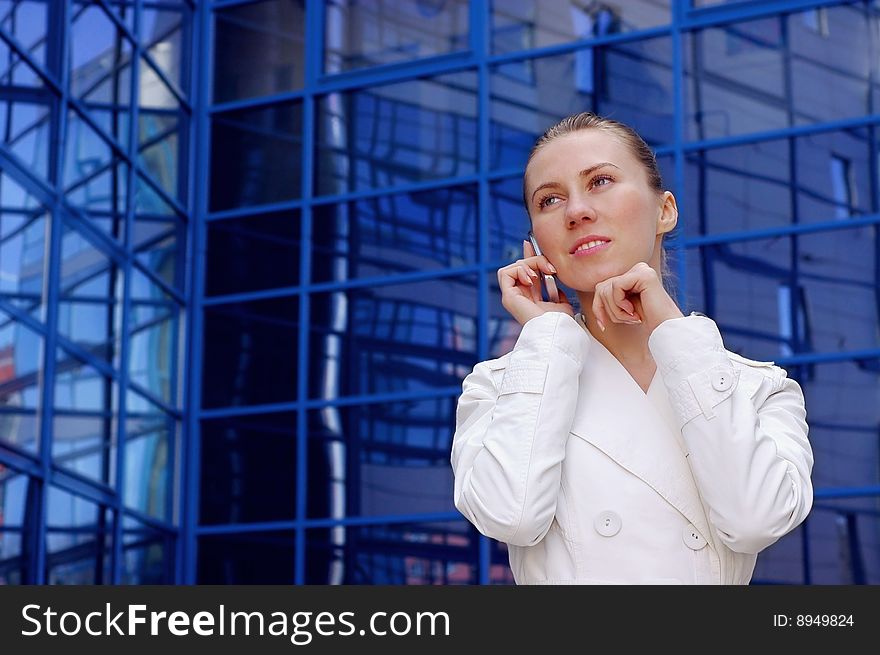Business women in white on business architecture background