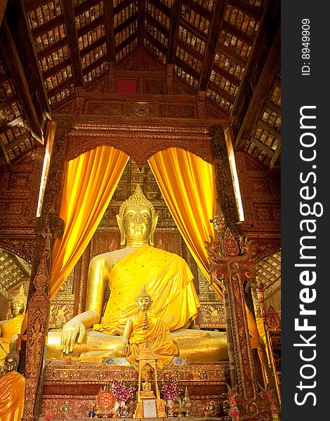 Buddha image in church of Wat Phra That Lam Pang Luang, Lam Pang province, Thailand