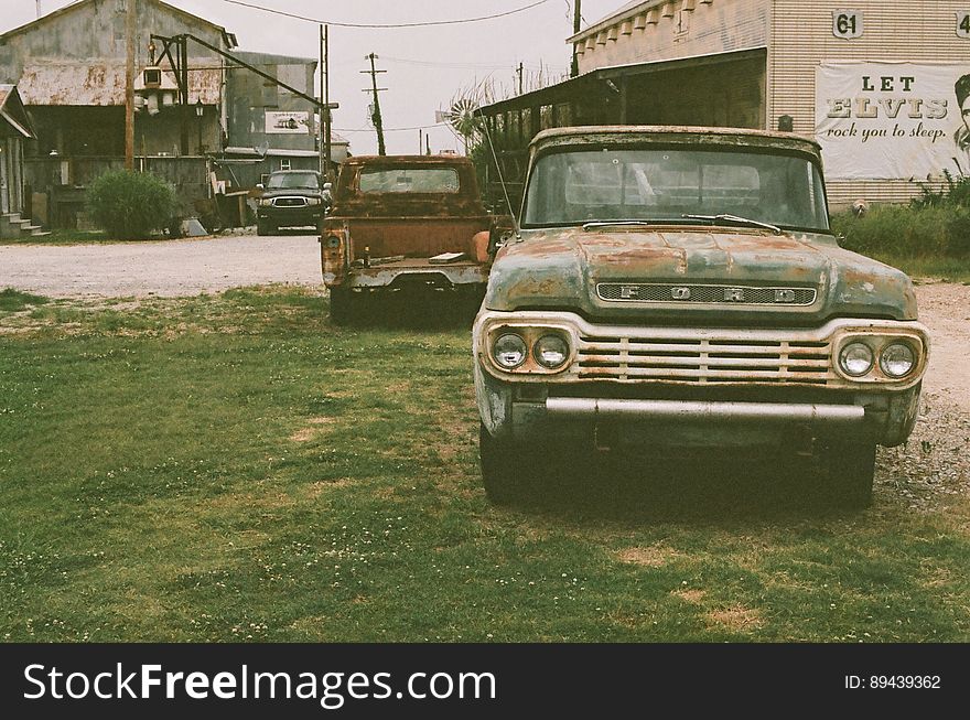 Vintage Ford Truck Parked In Grass