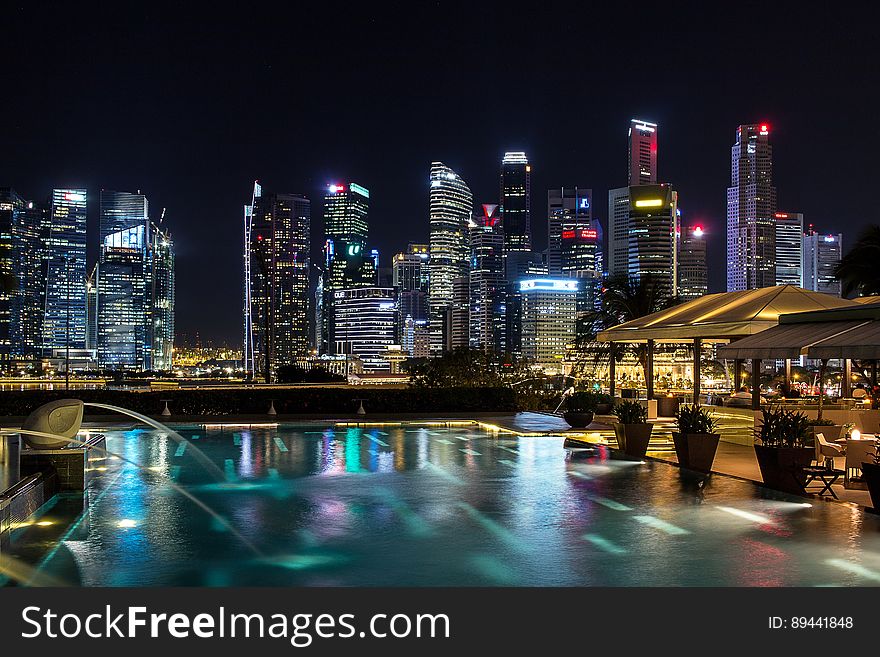 Singapore financial center at night seen from across the Marina Bay. Singapore financial center at night seen from across the Marina Bay.