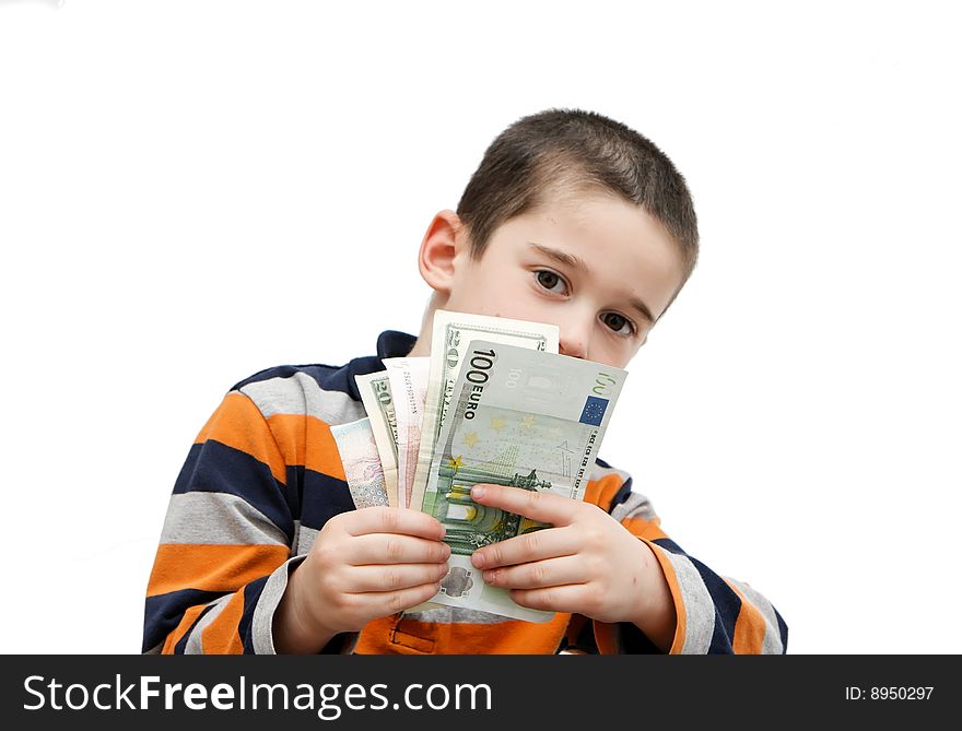 Cute little boy hides behind a fan of banknotes. Cute little boy hides behind a fan of banknotes