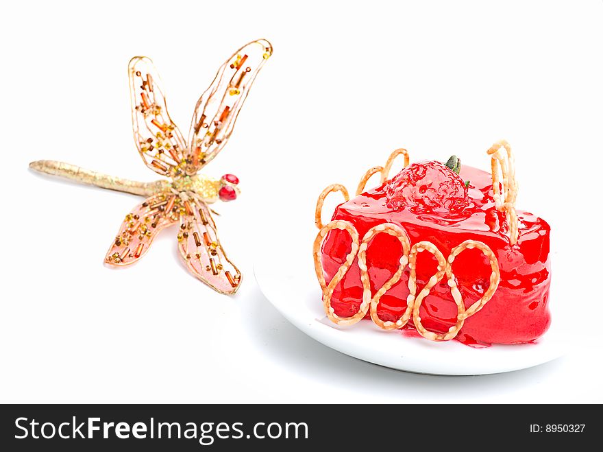 Cake with strawberry topping on a plate