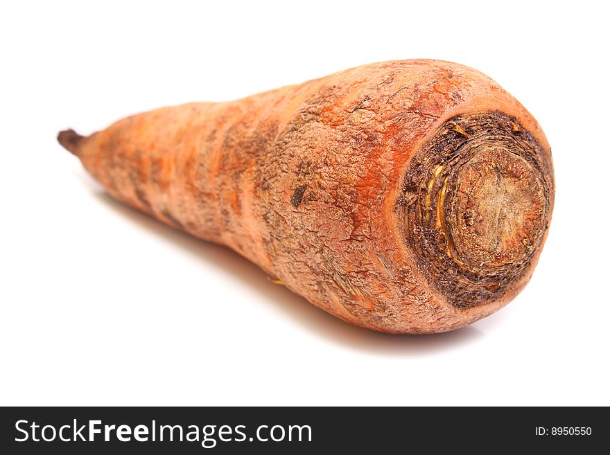 Raw fresh carrot isolated on white background