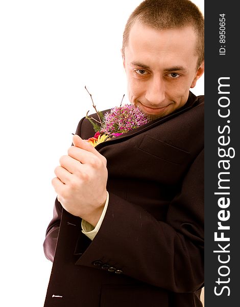 Man with flowers on white background