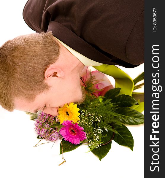 Man with flowers on white background. Man with flowers on white background