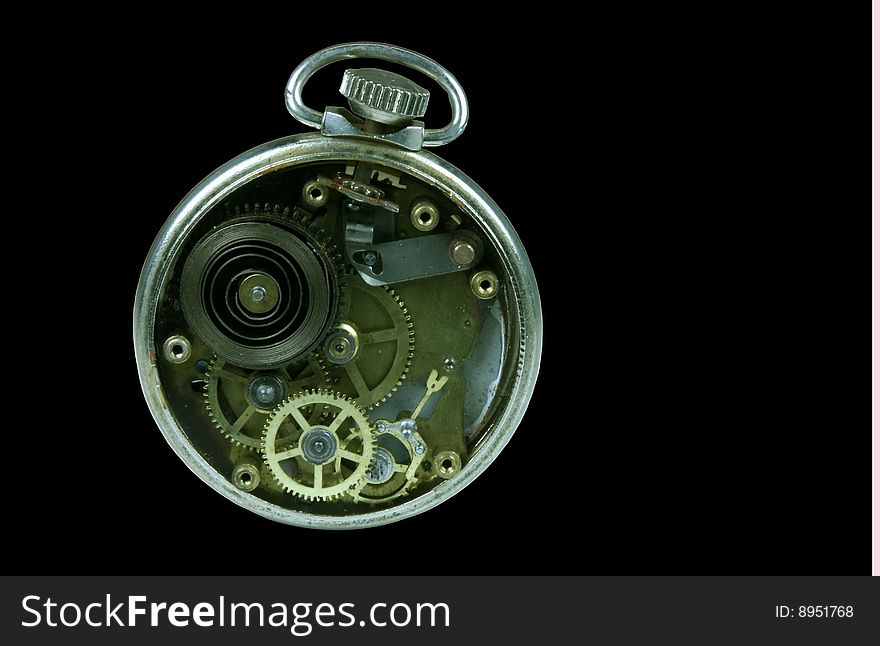 Antique pocket watch showing gears and spring on black. Antique pocket watch showing gears and spring on black