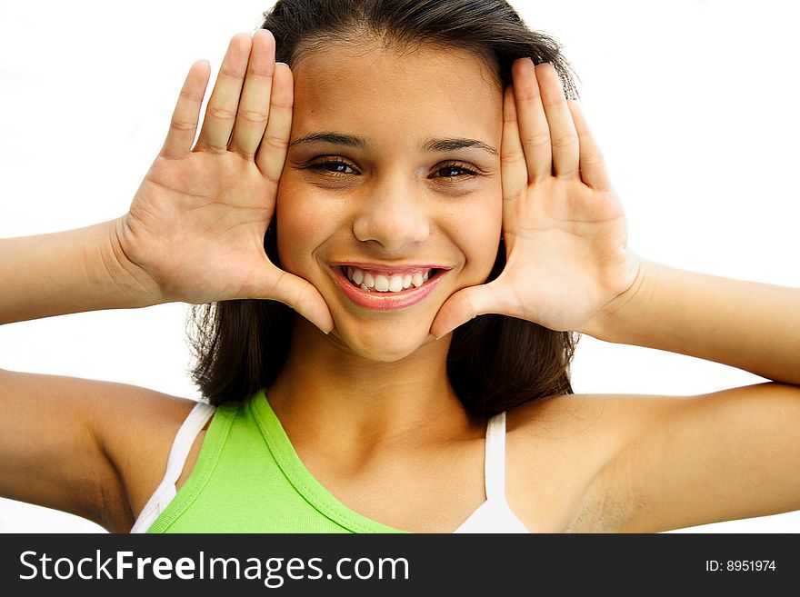 Adorable african american teenage girl framing her face with palms - isolated on white background. Adorable african american teenage girl framing her face with palms - isolated on white background.