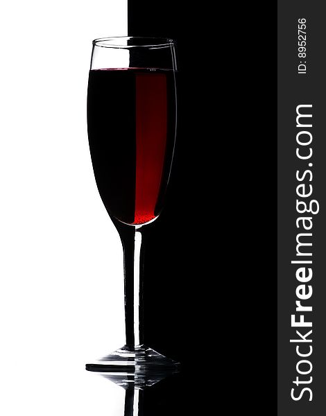 Wine glass isolated on black and white background. Wine glass isolated on black and white background