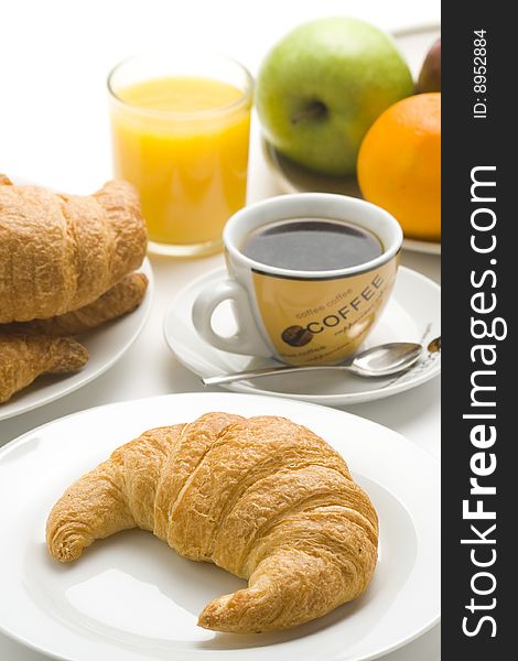 Continental Breakfast Of Coffee And Croissants