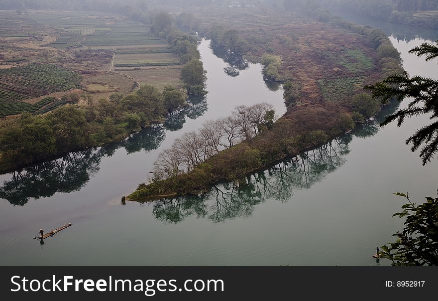 River by a village in the south of china. River by a village in the south of china