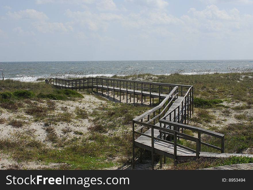 Atlantic Ocean with dunes and walkway. Atlantic Ocean with dunes and walkway