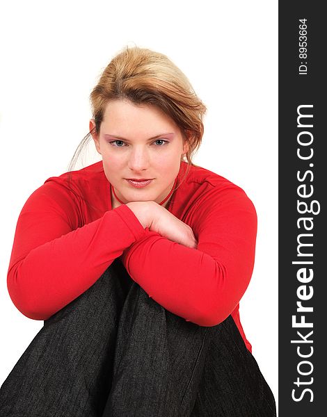 Portrait of young woman in red shirt, studio shot